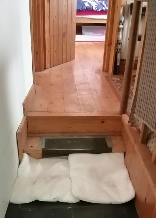 FloodSax alternative sandbags soaking up floodwater inside Anne’s cottage
