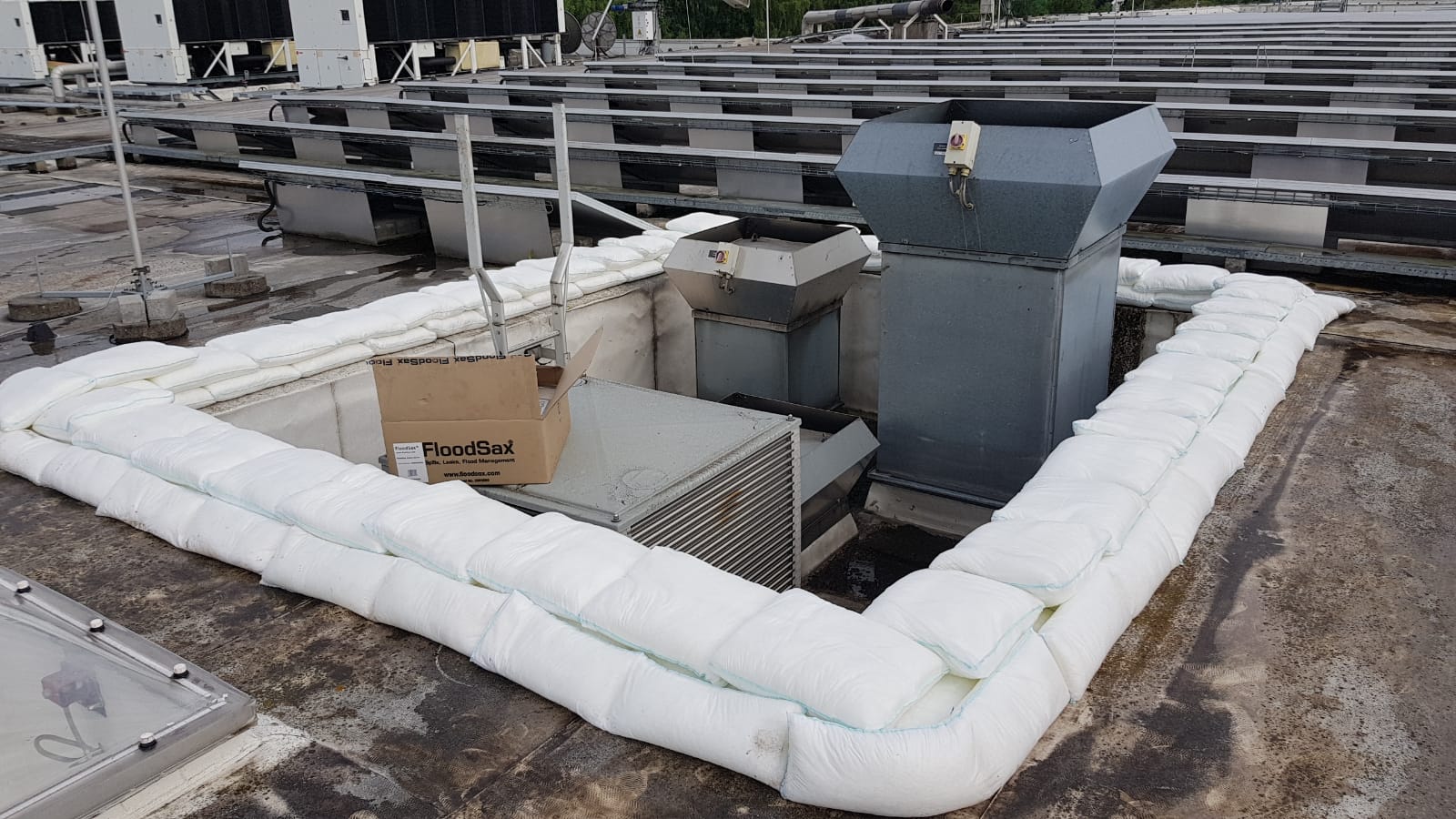 FloodSax protecting a roof from a faulty air conditioning unit