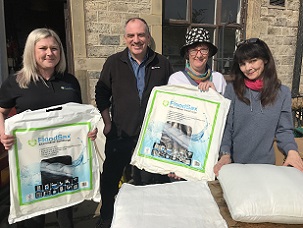 Pictured with FloodSax alternative sandbags are (from left) Jessica Bailey from FloodSax, Clr Andrew Cooper and Clr Karen Allison from Kirklees Council with Star pub landlady Sam Watt.
