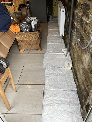FloodSax can be used in the dry state inside to soak up leaks, floods and spills. These are confining water from a leaking roof to a small part of an extension, protecting the floor and furniture