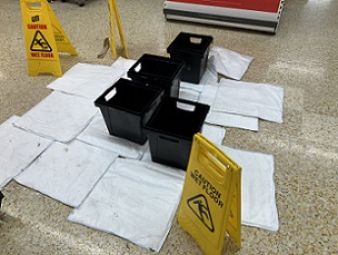 FloodSax soaking up water and preventing customers and staff from slipping in a supermarket