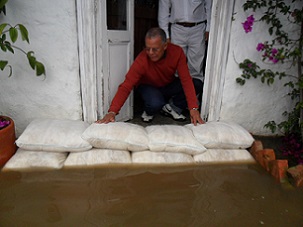 FloodSax protecting a home from filthy floodwater