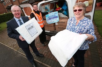 Clr Mark Robson with Hambleton District Council Street Scene Officer, Alan Scargill, delivering FloodSax Photo: Hambleton District Council