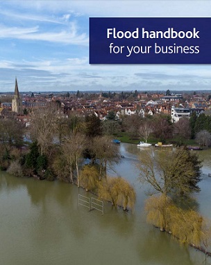 A barrier of FloodSax alternative sandbags keeps torrential floodwater out of businesses