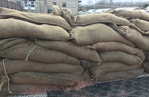 Sandbags tend to just rot and fall apart
